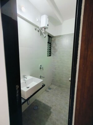 Bathroom in 1 BHK Apartment at Roshan Milestone, Tathawade – for Rent
