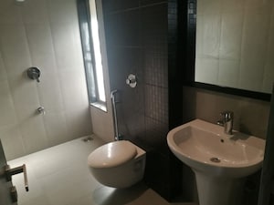 Bathroom in 2 BHK Apartment at Cosmos Jewels, Ghodbunder Road – for Rent