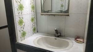 Bathroom in 1 BHK Apartment at Brightland Phase 1 CHS, Balkum Pada – for Rent