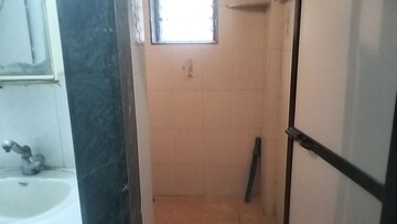 Bathroom in 1 BHK Apartment at Brightland Phase 1 CHS, Balkum Pada – for Rent