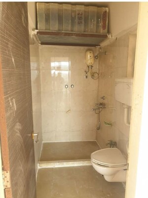 Bathroom in 3 BHK Apartment at Ravi Group Gaurav Woods, Mira Road – for Rent
