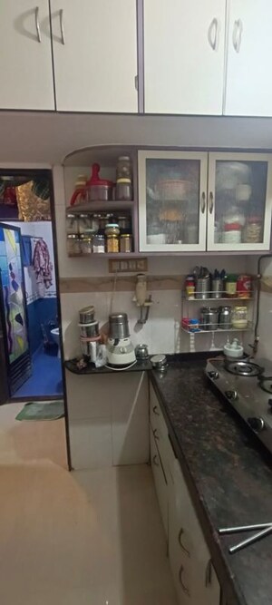 Kitchen in 1 BHK Apartment at Sai Raj Garden, Kandivali West – for Sale