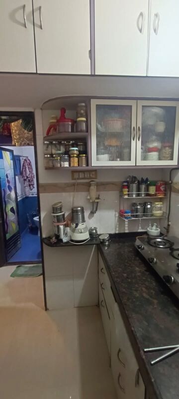 Kitchen in 1 BHK Apartment at Sai Raj Garden, Kandivali West – for Sale