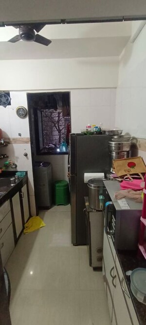 Team Area in 1 BHK Apartment at Sai Raj Garden, Kandivali West – for Sale