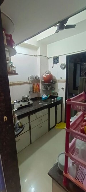 Kitchen in 1 BHK Apartment at Sai Raj Garden, Kandivali West – for Sale