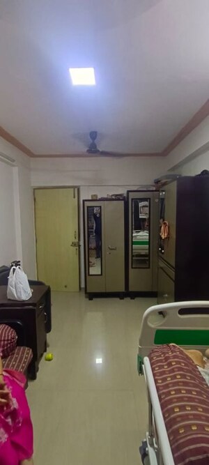 Living Room in 1 BHK Apartment at Sai Raj Garden, Kandivali West – for Sale