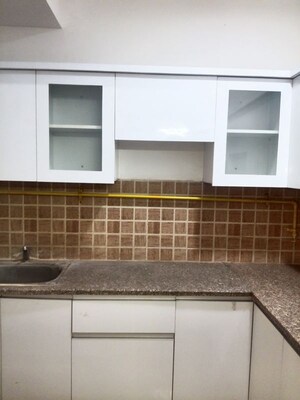 Kitchen in 2.5 BHK Apartment at Mahagun Mywoods II, Sector 16c Greater Noida – for Rent