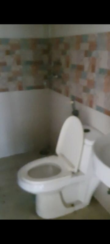 Bathroom in 3 BHK Apartment at AFOWO Raksha Addela, Sector 16c Greater Noida – for Rent