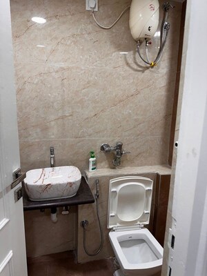 Bathroom in 2 BHK Apartment at Hiranandani Delanna, Ghodbunder Road – for Rent