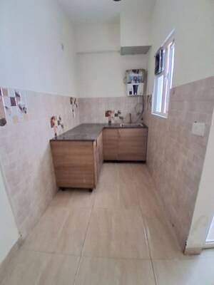 Kitchen in 2 BHK Apartment at Gaur City 2 - 14th Avenue, Sector 16c Greater Noida – for Rent