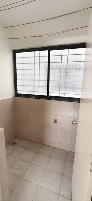 Bathroom in 2 BHK Apartment at Wadgaon Sheri – for Rent