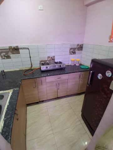 Kitchen in 2 BHK Apartment at Gaur City 2 - 14th Avenue, Sector 16c Greater Noida – for Rent