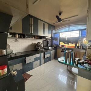 Kitchen in 2 BHK Apartment at Om Utopia, Netaji Nagar – for Rent