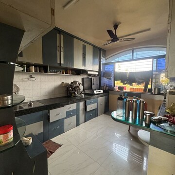 Kitchen in 2 BHK Apartment at Om Utopia, Netaji Nagar – for Rent