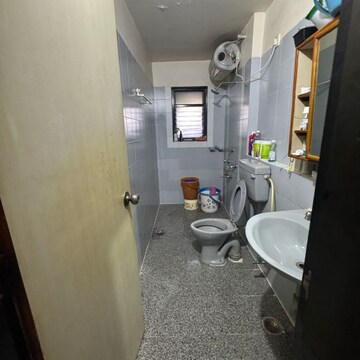 Bathroom in 2 BHK Apartment at Om Utopia, Netaji Nagar – for Rent