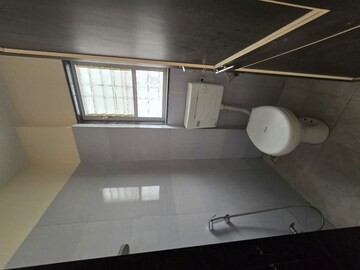Bathroom in 1 BHK Apartment at Wadgaon Sheri – for Rent