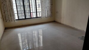Room in 2 BHK Apartment at Riddhi Tower, Malad East – for Rent