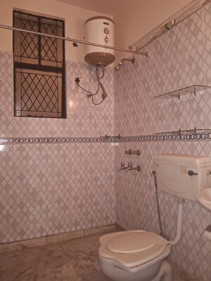 Bathroom in 2 BHK Builder Floor at East Of Kailash – for Rent