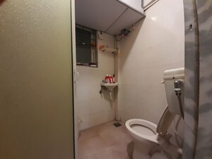 Bathroom in 2 BHK Apartment at Royal Palms, Goregaon East – for Sale