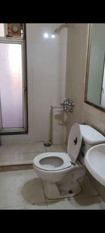 Bathroom in 3 BHK Apartment at Hiranandani Bloomingdale, Ghodbunder Road – for Sale