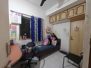 Living Room in 2 BHK Apartment at Bajaj Nagar – for Sale