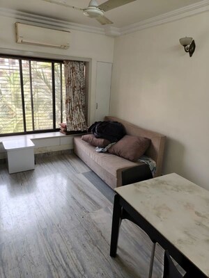 Living Room in 1 BHK Apartment at Ashok Vihar CHS, Marol – for Rent
