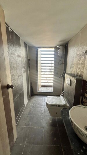 Bathroom in 2 BHK Apartment at Cosmos Heritage, Manpada – for Sale