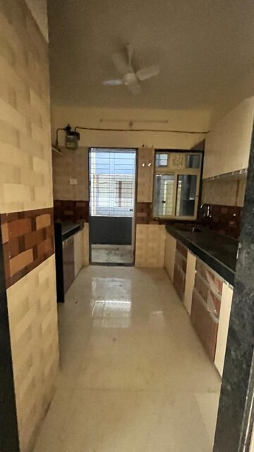 Kitchen in 2 BHK Apartment at Cosmos Heritage, Manpada – for Sale