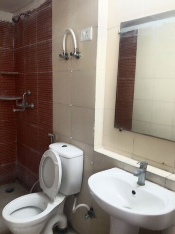 Bathroom in 3 BHK Apartment at Mahagun Mywoods III, Sector 16c Greater Noida – for Rent