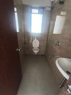 Bathroom in 1 BHK Apartment at Abrol Signature, Malad West – for Rent