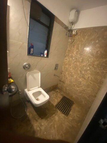 Bathroom in 1 BHK Apartment at Atul Blue Fortune, Andheri East – for Rent