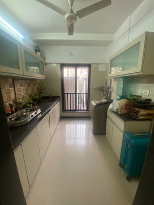 Kitchen in 1 BHK Apartment at Atul Blue Fortune, Andheri East – for Rent