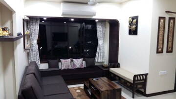 Living Room in 2 BHK Apartment at Dheeraj Heritage Residency, Santacruz West – for Sale