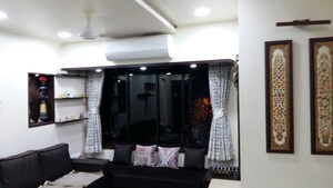 Room in 2 BHK Apartment at Dheeraj Heritage Residency, Santacruz West – for Sale