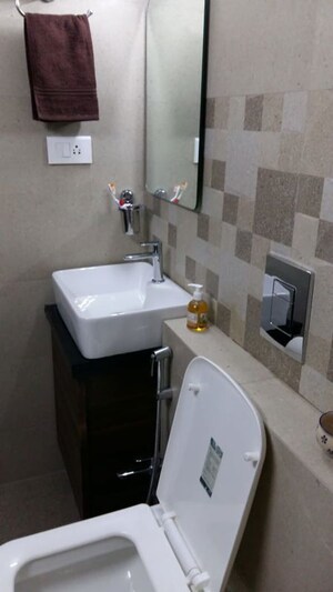 Bathroom in 2 BHK Apartment at Dheeraj Heritage Residency, Santacruz West – for Sale