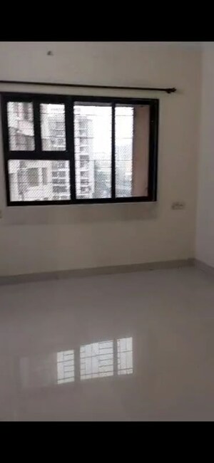 Bedroom in 2 BHK Apartment at Dheeraj Solitaire, Malad West – for Sale