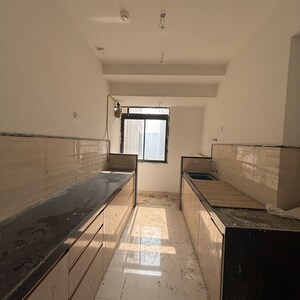 Kitchen in 2 BHK Apartment at Dynamix Divum, Riddhi Gardens – for Rent
