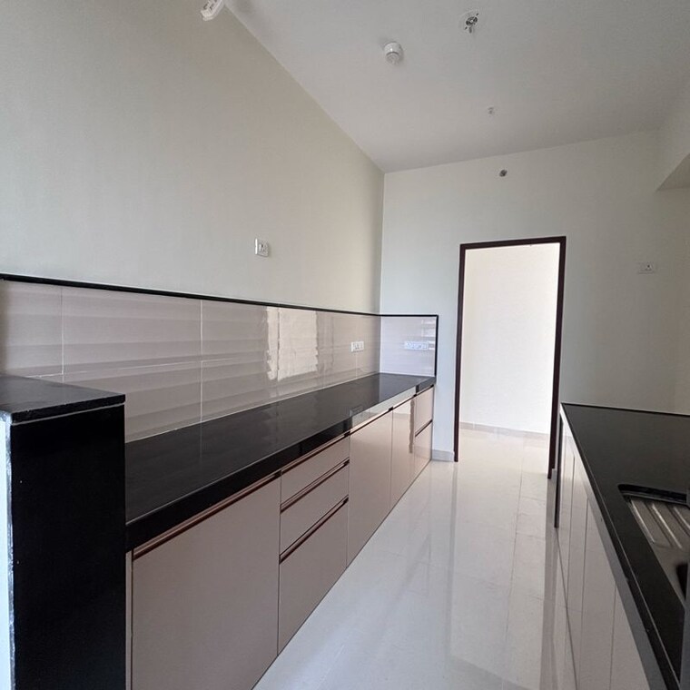 Kitchen, dynamix-divum 2 Bedroom 788 Sq.Ft. Apartment In Riddhi Gardens Mumbai 9944645