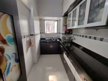 Kitchen in 1 BHK Apartment at Golders Green CHS, Borivali West – for Sale