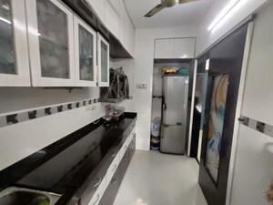 Kitchen in 1 BHK Apartment at Golders Green CHS, Borivali West – for Sale
