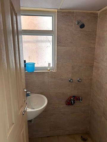 Bathroom in 1 BHK Apartment at Wave Dream Homes, Wave City – for Rent