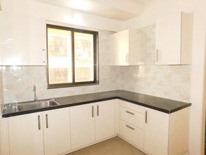 Kitchen in 1 BHK Apartment at Veda CHS, Ic Colony – for Sale