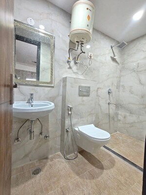 Bathroom in 4 BHK Apartment at Satguru Apartments, Sector 52 – for Rent