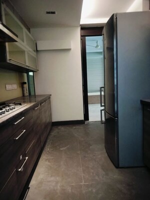 Kitchen in 4 BHK Apartment at Vasant Vihar – for Rent