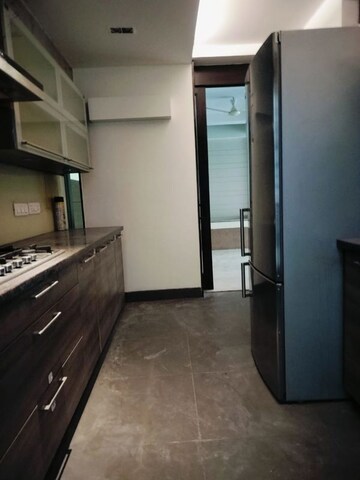 Kitchen in 4 BHK Apartment at Vasant Vihar – for Rent