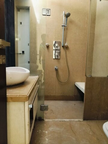 Bathroom in 4 BHK Apartment at Vasant Vihar – for Rent