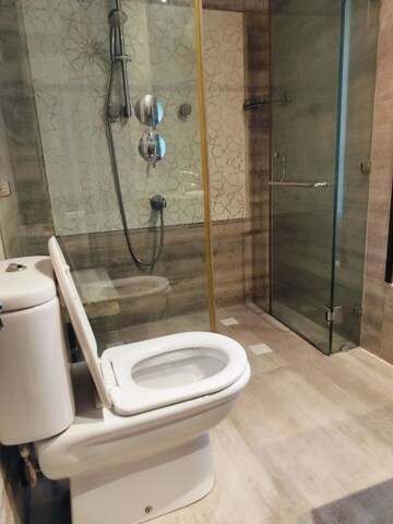 Bathroom in 4 BHK Apartment at Vasant Vihar – for Rent