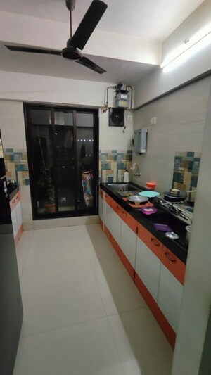 Kitchen in 3 BHK Apartment at Om Malaygiri CHS, Borivali East – for Rent