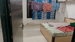 Bedroom in 3 BHK Apartment at Om Malaygiri CHS, Borivali East – for Rent