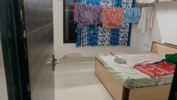 Bedroom in 3 BHK Apartment at Om Malaygiri CHS, Borivali East – for Rent